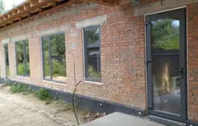 Вікна та двері WDS 76 AD з ламінацією Антрацит піщаний у приватному будинку в Бобриці